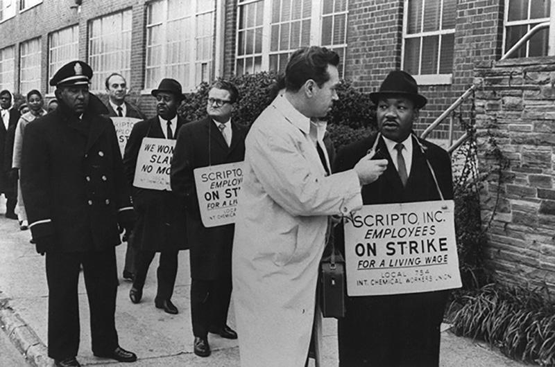 Martin Luth King, Jr. in a group of picketers