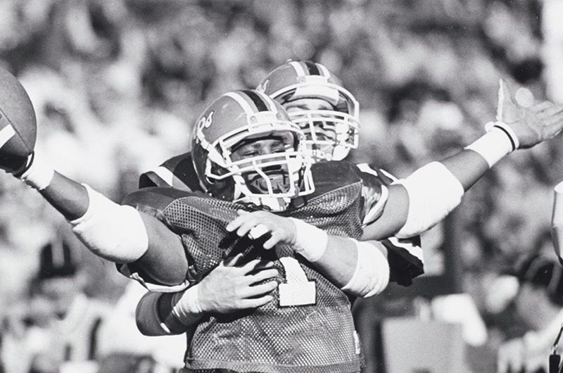 Terrapin football players celebrate after a play